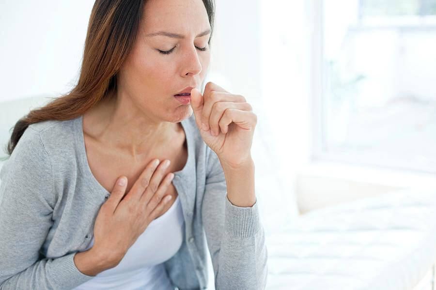 1-young-woman-coughing-science-photo-library (1)